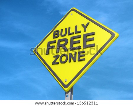A yield road sign with a Bully Free Zone Yield Sign