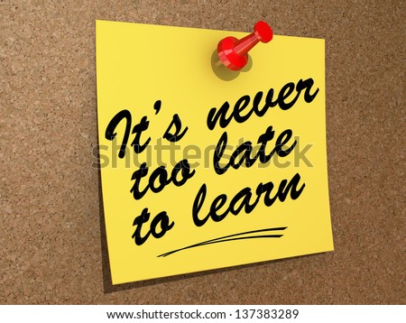 A note pinned to a cork board with the text It\'s Never Too Late to Learn.