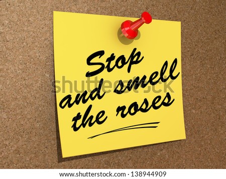 A note pinned to a cork board with the text Stop and Smell the Roses.