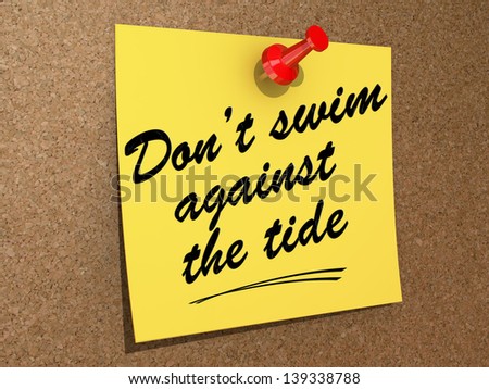 A note pinned to a cork board with the text Don\'t Swim Against the Tide.