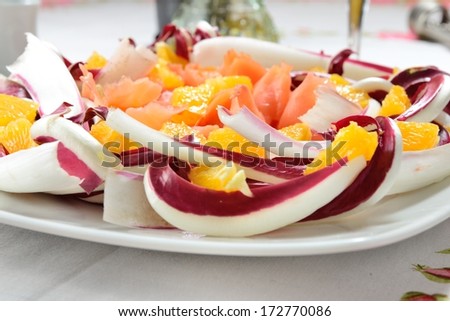 smoked salmon with orange and red salad