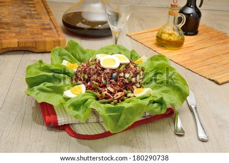 red rice salad on lettuce leaves