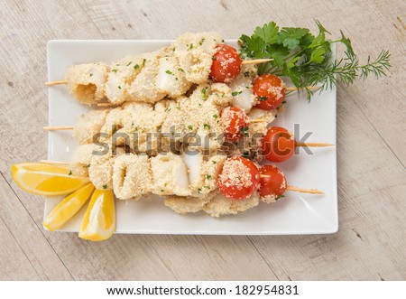 cuttlefish and squid skewers with tomato