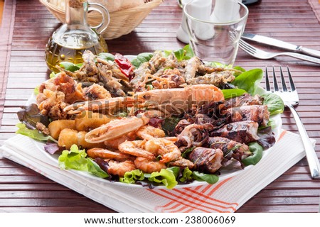 Serving dish with mixed fried fish and shellfish