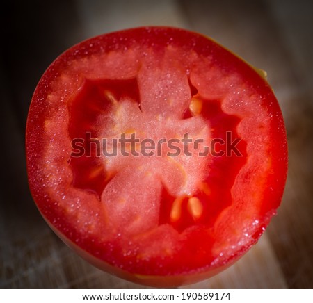 Super macro shot of raw tomatoes surface. Selective focus with very shallow depth of field.