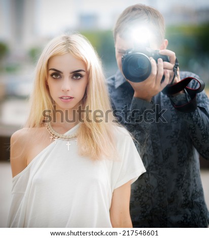 The photographer and his model. Selective soft focus.
