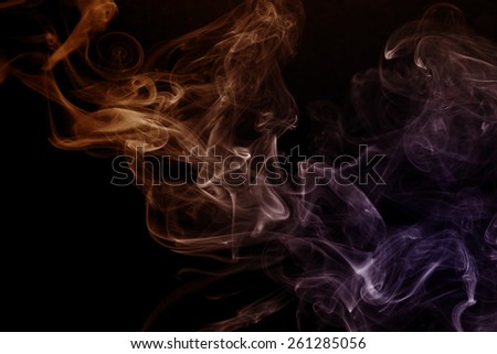 Blue-orange smoke on a black. Abstract background.