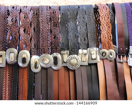 Hand crafted leather belts with unique buckles, market, Majorca, Spain