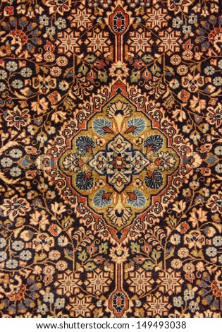 ancient rug with oriental design