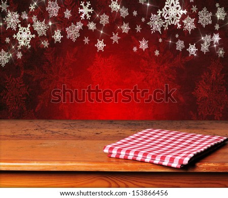 Empty wooden table for product display montages - winter theme