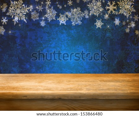 Empty wooden table for product display montages - winter theme