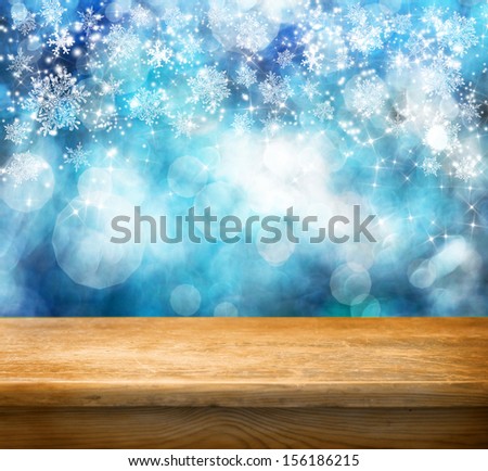 Empty blue table for product display montages - christmas and new year theme