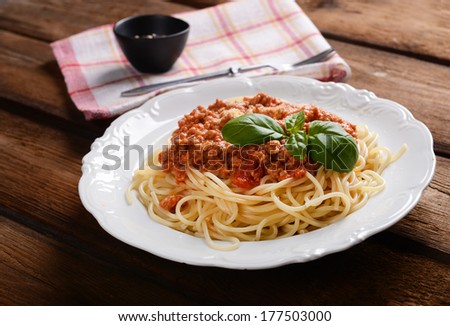 Tasty spaghetti with cheese and basil