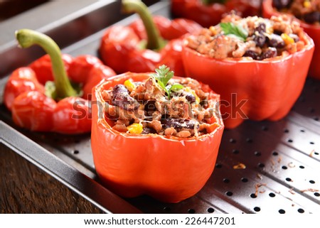 Stuffed peppers with meat, kidney beans and corn