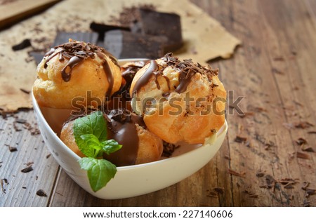 Profiteroles - italian dessert witch chocolate sauce