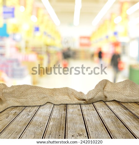 Empty table and blurred store in background