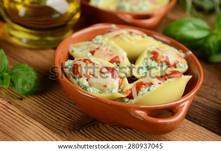 Pasta shells stuffed with ricotta cheese and spinach
