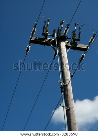 power lines in front of the blue sky