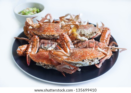 Delicious boiled Flower Crab with seafood dip