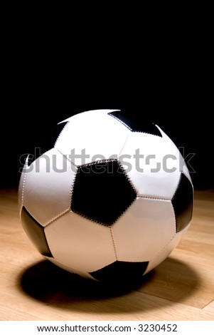 A standard leather football or soccer ball