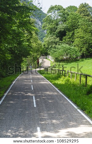 Cycle lane in Valle Brembana (Bergamo, Lombardy, Italy) at summer