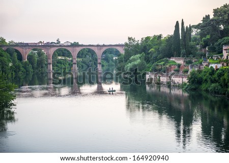 Albi (Tarn, Midi-Pyrenees, France) - Panoramic view from the ancient bridge over the Tarn river at evening