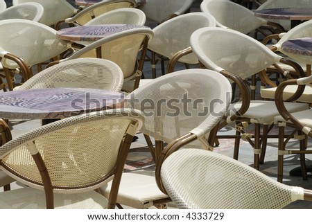 Limoux (France) - Chairs and tables of a bar