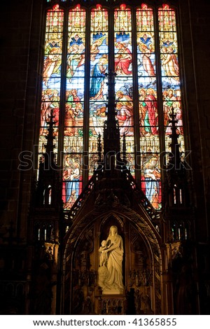 Dinan (Cotes-d\'Armor, Brittany, France) - Interior of the Saint-Malo church, in gothic style: stained glass and statue