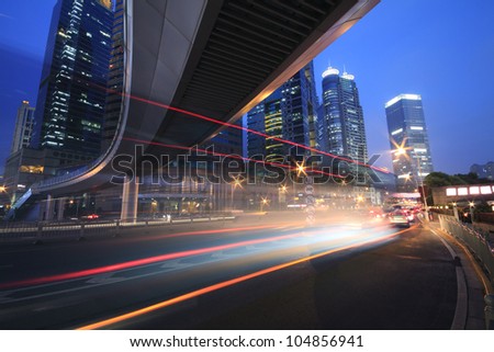 Urban viaduct traffic of car night with light trails