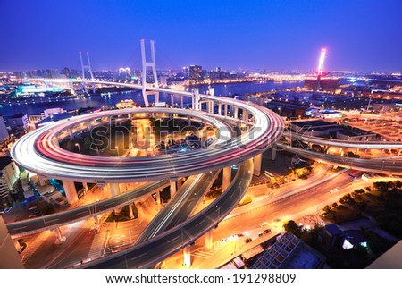 Spiral bridge in Shanghai Huangpu River on the bird\'s eye view of the beautiful night view