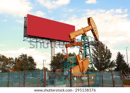 Golden yellow Oil pump oil rig and billboard energy industrial machine for petroleum crude
