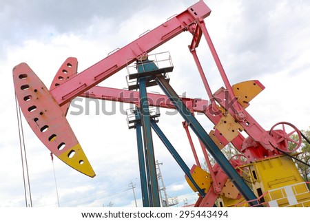 Pink Oil pump oil rig energy industrial machine for petroleum crude of countryside,dirt road