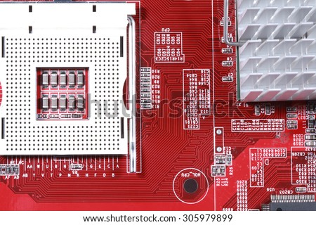 Close-up of electronic circuit red board with processor of computer motherboard