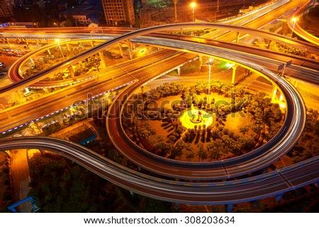 Aerial view of Wuhan at City viaduct overpass road night scene.Similar to the shape of the human eyes.