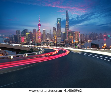 Empty road textured floor with Aerial photography bird-eye view at Shanghai bund Skyline of night scene