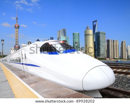 High-speed trains in the Shanghai Lujiazui City background