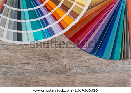 Swatch of colouring on wooden table background