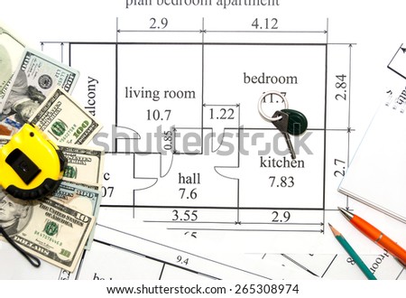 apartments plan with dollar, pen  and key