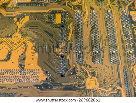 Close up of  yellow computer circuit board