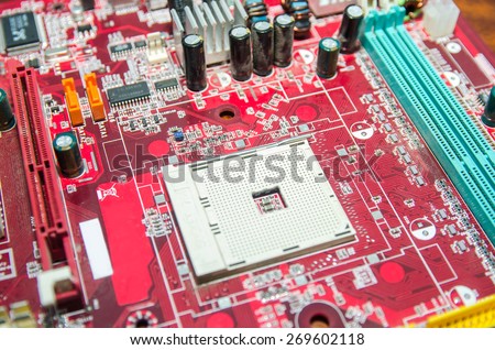 Printed red computer motherboard