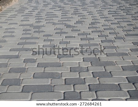 texture of grey cobblestone road