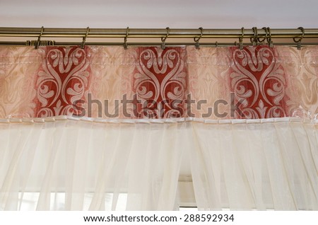 Close up elegance curtain. part of draperies at a window. Decoration background
