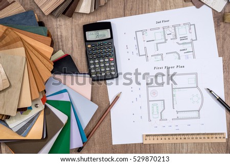 house plan with a choice of wooden on desk.