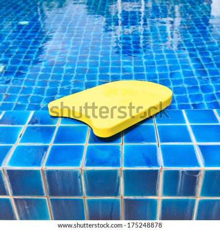Yellow foam board on modern swimming