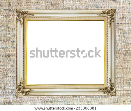 Blank old vintage frame on woven cloth wall background