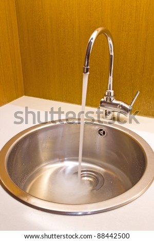 modern kitchen sink with stainless steel basin