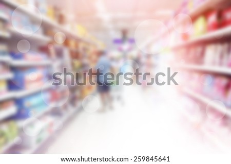 Person Shopping In Retail Store Blurred Background