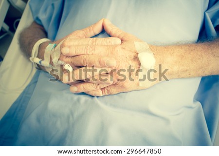 Close Up Shot Of Patient In Hospital Bed And Having Iv Solution Drop In Patient Hand,Healthcare And Medical Concept Background,Filter Image