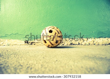 Sepak Takraw Ball On Cement Background,Asia Traditional Sport Games