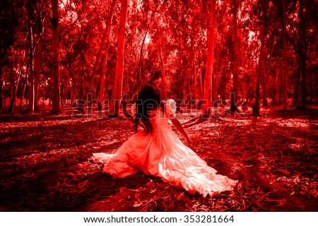 Blood Forest,Mysterious Woman in White Dress in the Forest,Scary Woman in the Wood,Horror Background For Halloween Concept and Book Cover Ideas